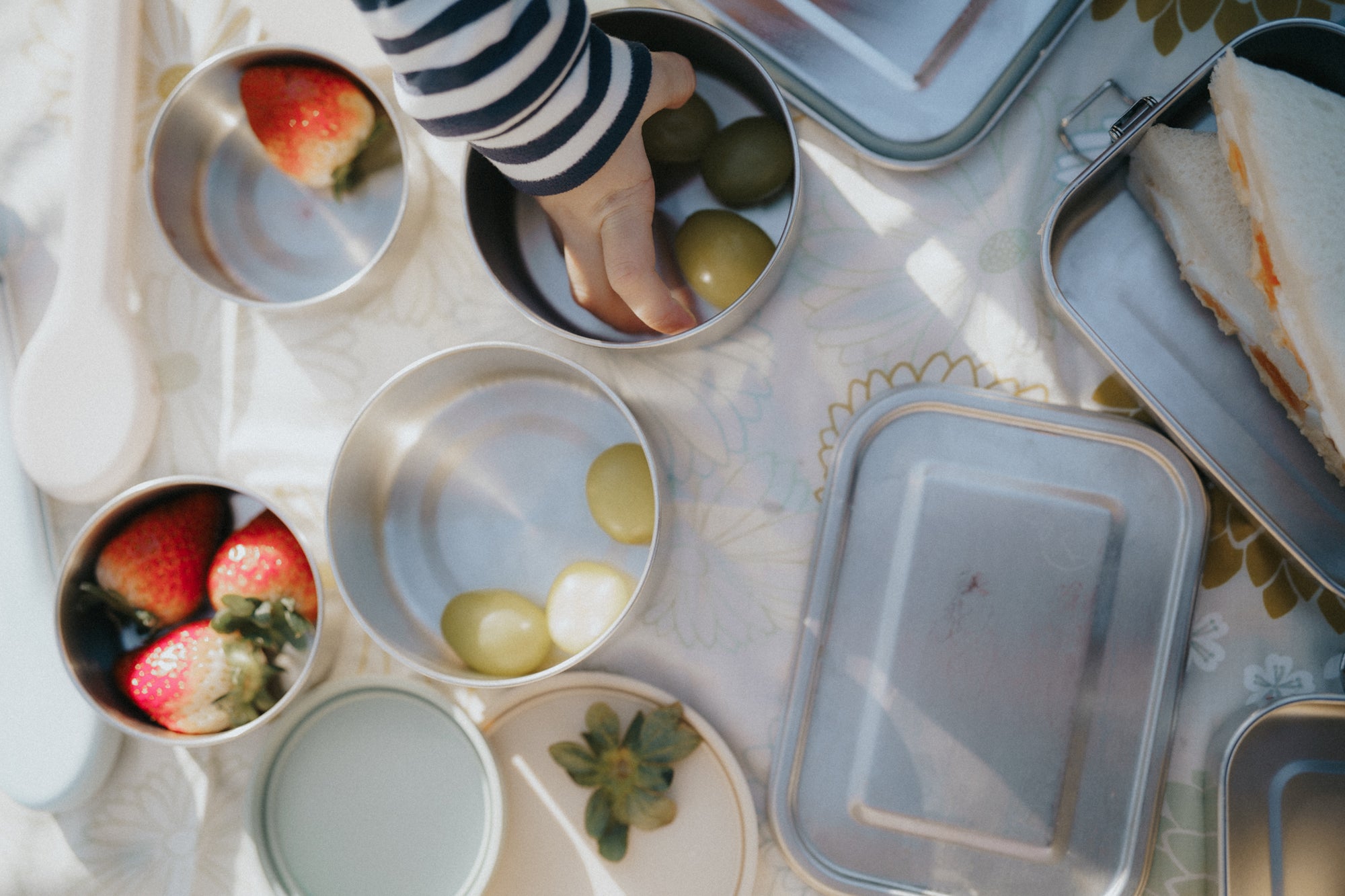 A Kinder Nest 304 stainless steel lunch box / container - available in three sizes with adjustable dividers for plastic-free meals.
