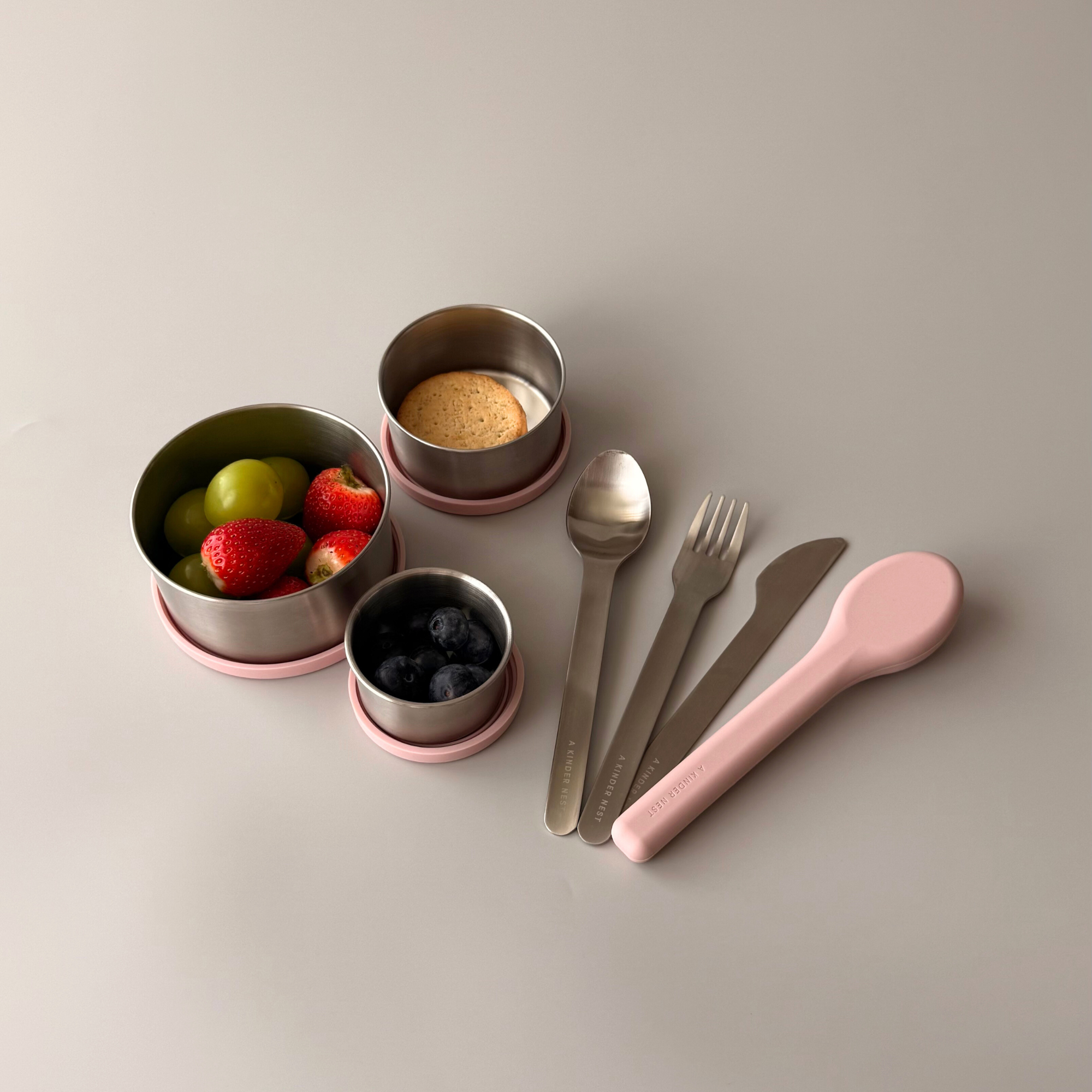 Stainless steel cutlery sets showing different color options for the washable silicone travel pouches.
