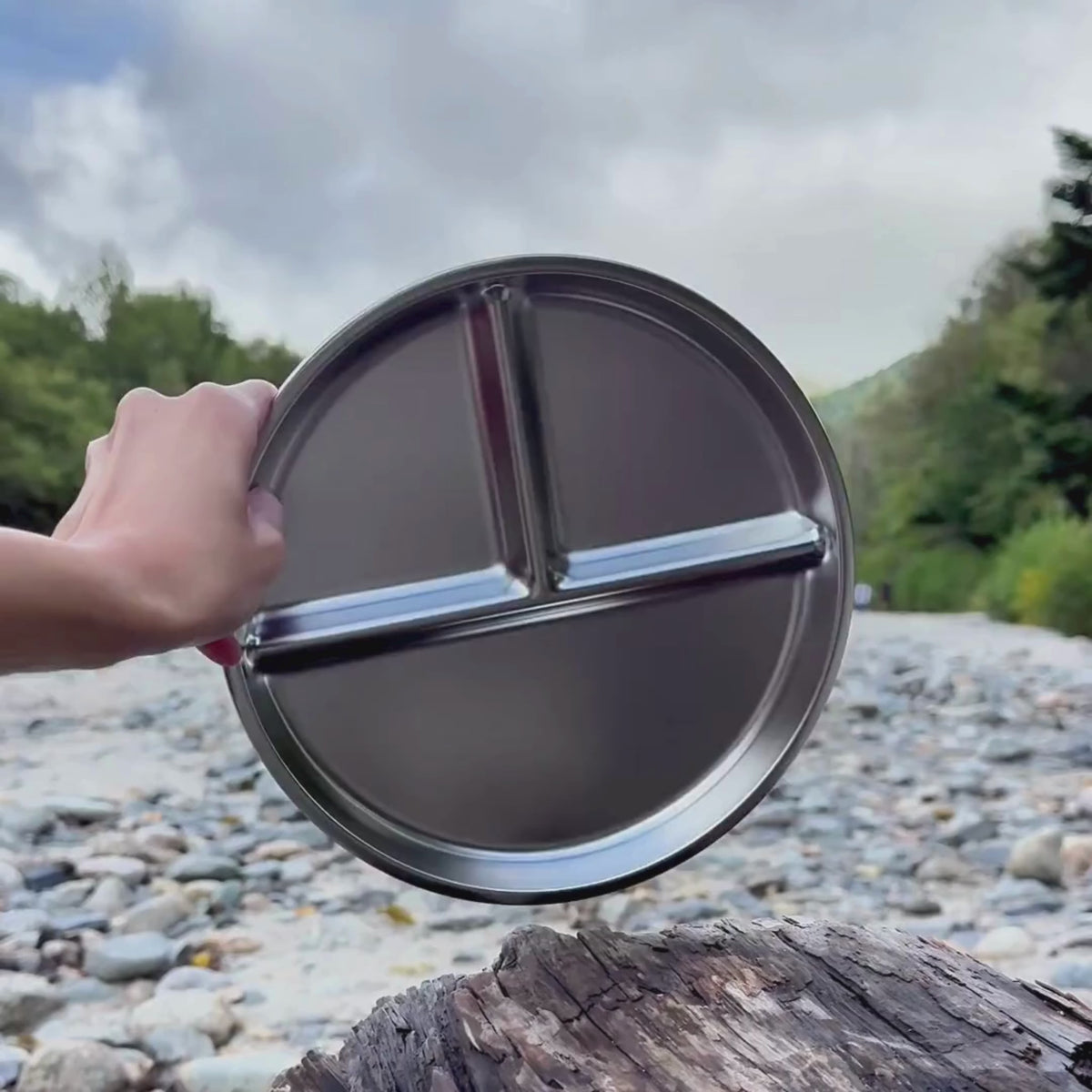 A Kinder Nest 3-section stainless steel divided plate for kids, featuring a plastic-free and shatter-proof design.